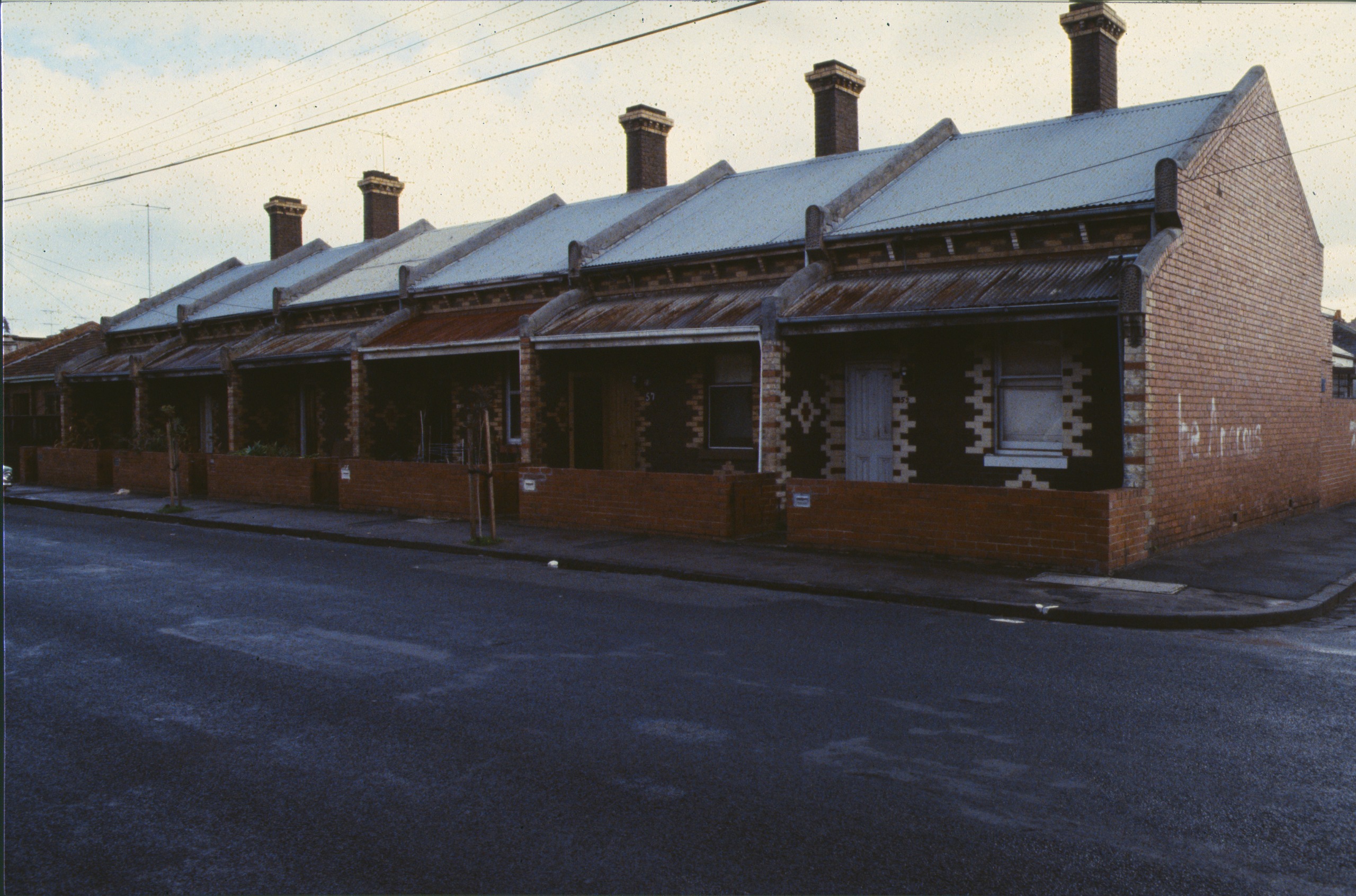 Streetscape view of workers' cottages on Upton Road, photographed in1983